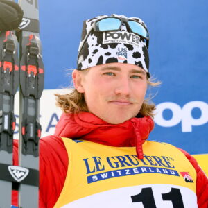 Gus Schumacher of United States celebrates on the podium after the men's 20 km mass start during the FIS Cross-Country World Cup on February 16, 2025 in Falun.