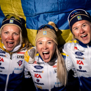 Emma Ribom (silver) Jonna Sundling (gold) and Maja Dahlqvist (bronze) of Sweden celebrate after Women's Cross Country Skiing Sprint final during the FIS Nordic Ski World Championships on February 23, 2023 in Planica.